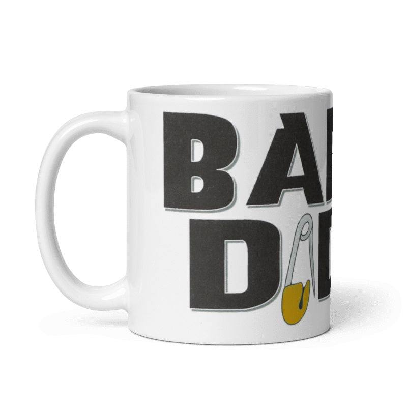 Cream ceramic mug with "Baby Daddy" text, available in 11oz and 15oz sizes, microwave and dishwasher safe.