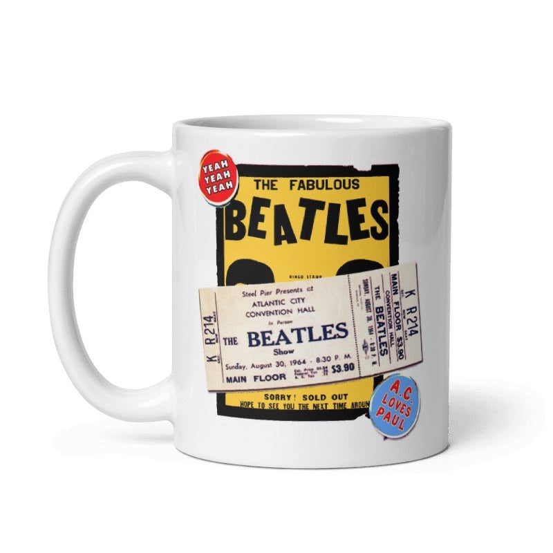 Beatles '64 Atlantic City Ceramic Mug featuring concert ticket design, cream color, 11oz and 15oz sizes, microwave and dishwasher safe.