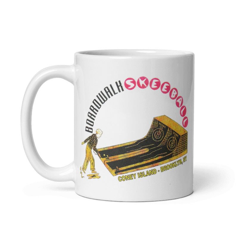 Coney Island Skeeball Mug featuring nostalgic boardwalk design, ceramic, cream color, available in 11oz and 15oz, microwave and dishwasher safe.