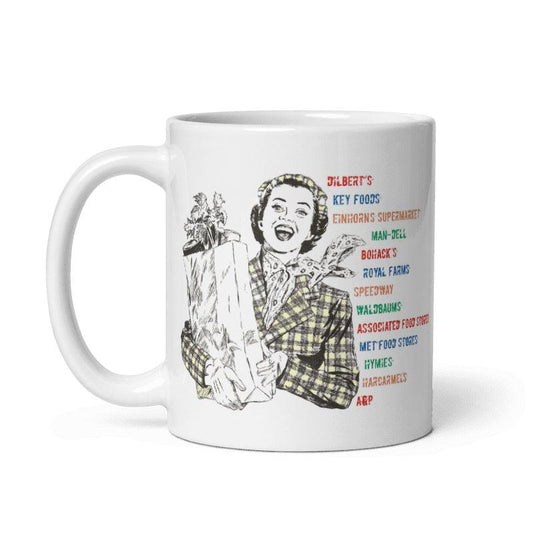 Ceramic mug with vintage design featuring Brooklyn market motifs and grocery names.