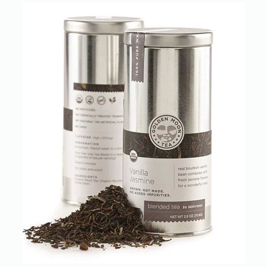 Vanilla Jasmine Green Leaf Tea in silver tins with loose leaf display.