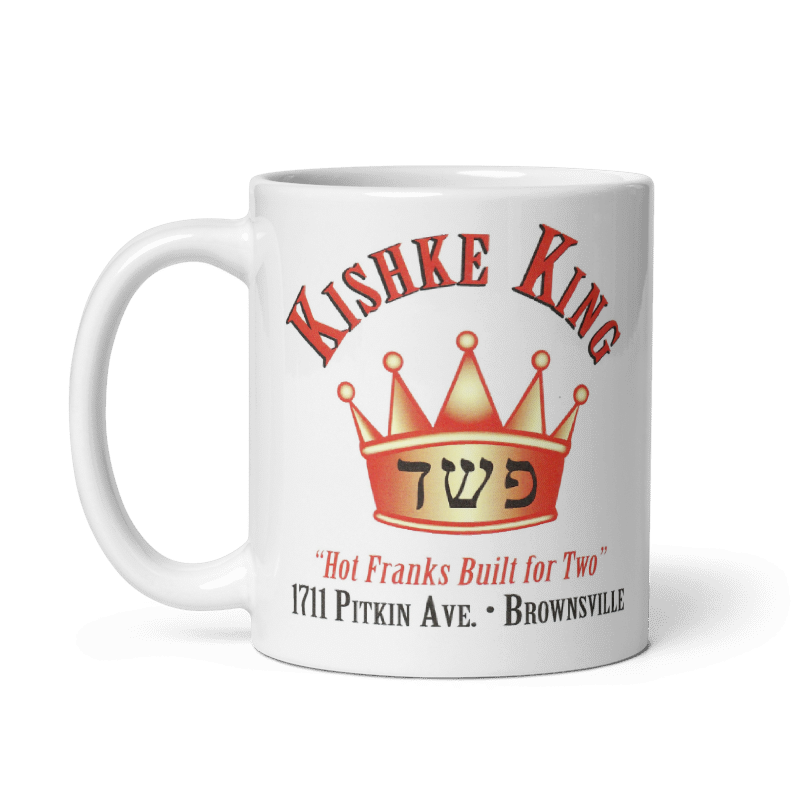 Brooklyn Kishke King ceramic mug with crown design, cream color, available in 11oz and 15oz, microwave and dishwasher safe.