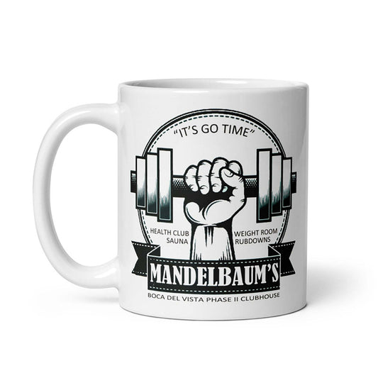Cream Mandelbaum's Gym Seinfeld Mug featuring gym-themed design, available in 11oz and 15oz.