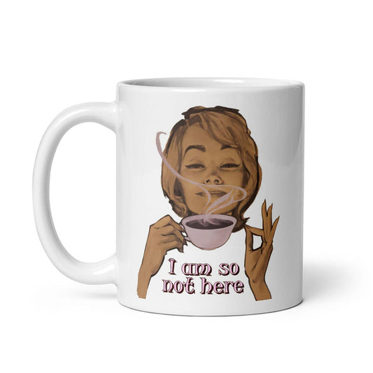 Retro-inspired cream 'My Coffee Break Ceramic Mug' with a playful design, available in 11 and 15-ounce sizes; microwave and dishwasher safe.