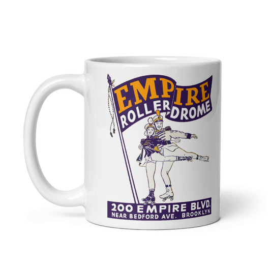 Cream Empire RollerDrome ceramic mug with vintage skating design, available in 11oz and 15oz sizes.