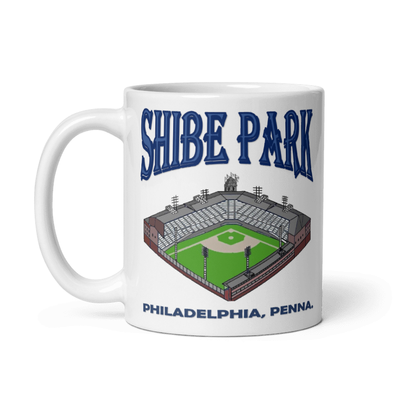 Vintage Shibe Park Ceramic Mug featuring Philadelphia stadium design, cream color, 11oz and 15oz, microwave and dishwasher safe.