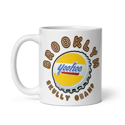 Brooklyn Skully Champ Mug with Yoo Hoo cap design, ceramic, 11oz and 15oz sizes, cream color.