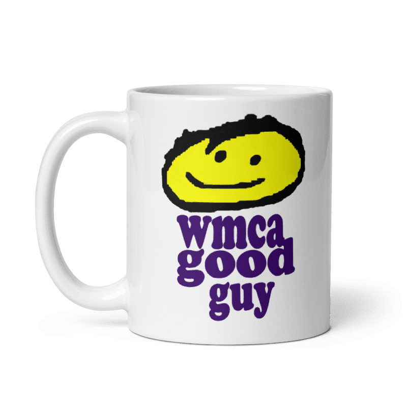 WMCA New York Mug with retro design featuring "Good Guy" text in cream color, available in 11oz and 15oz sizes.